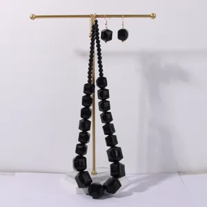 Set collana e orecchini di perle in acrilico geometrico nero elegante gioiello