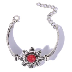 Vintage silver tone flower bracelet with red stone center, adjustable chain link for women.