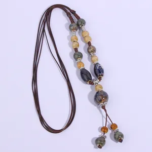 Long ethnic style ceramic beaded sweater chain necklace, retro casual clothing accessories.