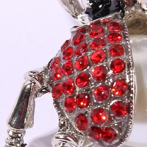 Detailed view of rhinestone beetle brooch close up, silver metal insect fashion jewelry pin