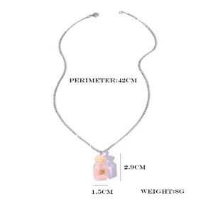 Detailed view of summer beach wishing bottle pendant necklace with clear glass jar. 42cm.