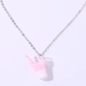 Close-up detail of the cute pink and white drink cup pendant necklace with fine silver chain.