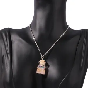 Summer ocean style wishing bottle pendant necklace with cute pink sand and miniature star charms.