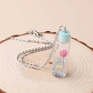 Charming cute dried flower drift bottle pendant necklace with silver chain for women detail.