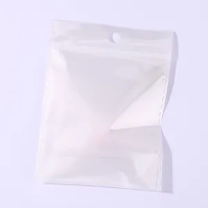 Clear plastic packaging bag detail, transparent ziplock pouch with hang hole for accessories.