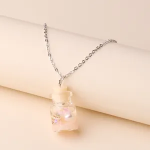 Close-up detail of the summer beach wishing bottle necklace pendant with shell and pearl.