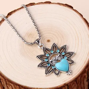 Vintage Owl Pendant Necklace Bohemian Turquoise Blue Rhinestone Detail Close-up Shot