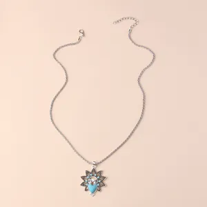 Vintage owl pendant necklace with blue turquoise stone, detailed bohemian style silver chain.
