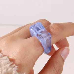 Chic blue acrylic resin geometric ring for women, trendy chunky statement finger jewelry.