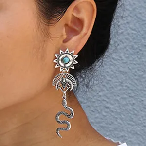 Retro snake drop earrings with sun and turquoise charms, vintage alloy statement ear jewelry.