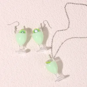 Detailed view of cute kiwi cocktail glass resin earrings and necklace set, fresh green design.