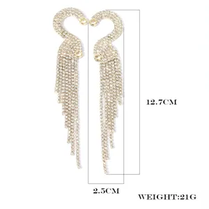 Long rhinestone fringe earrings with sparkling crystals, elegant drop design detail.