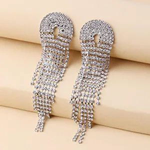 Long rhinestone fringe earrings, European style exaggerated shiny crystal tassel jewelry for women.