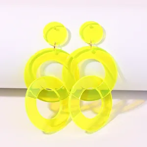 Neon yellow acrylic geometric drop earrings, bold double round design, summer fashion jewelry.