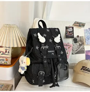 Black denim backpack with star print and angel wings, stylish student school bag for daily use.