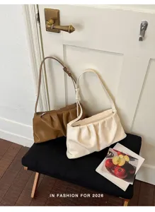 Chic pleated shoulder bag for women, stylish summer underarm cloud handbag with adjustable strap.