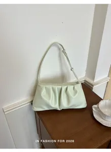Stylish light green ruched underarm shoulder bag cloud bag for women fashion daily wear.