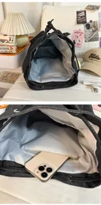 Large capacity black denim backpack for women, Korean style casual school book bag with zip pocket.