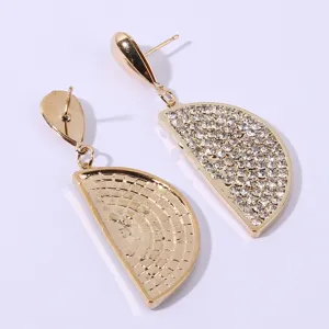 Elegant rhinestone half-lemon dangle earrings for women, sparkling gold-toned fashion jewelry.