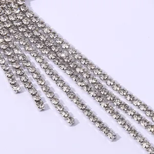 Rhinestone tassel earring sparkling detail shot, fashion silver crystal fringe jewelry for women.