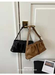 Detailed view of the stylish pleated underarm shoulder cloud bag, chic PU leather design.