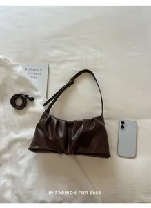 Brown pleated shoulder bag detail, stylish PU leather hobo handbag with strap for daily wear.