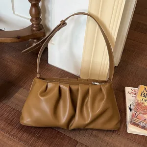 Trendy brown ruched shoulder bag for women, chic PU leather underarm cloud bag for daily.