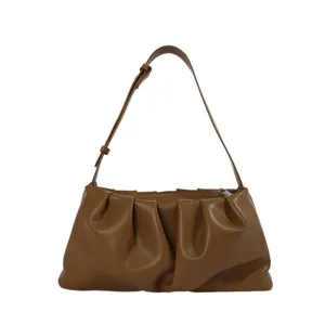 Stylish brown pleated underarm cloud bag for women, trendy fashion shoulder and crossbody bag.