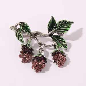 Vintage blackberry brooch with green enamel leaves and sparkling purple rhinestones for women.