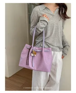 Stylish purple woven leather tote bag for women, spacious casual shoulder bag for daily use.