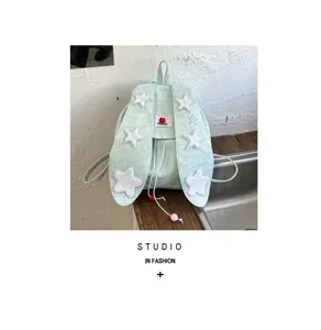 Sweet college style mint green canvas backpack with star patches and cute bunny ear design.