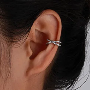 Sparkling rhinestone cross ear cuff for women, stylish cartilage clip on earring.