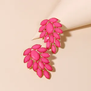 Fashion pink acrylic statement earrings with gold-tone metal trim for women party wear.