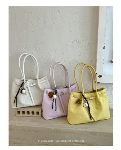 Woven tote shoulder bag, large capacity commuting handbag with stylish woven texture and elegant design.
