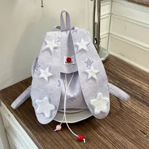 Sweet college style canvas backpack with cute star patches and bunny ears design for daily student use.