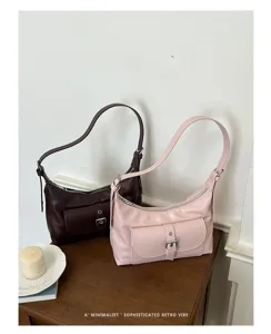 Minimalistische retro dames schoudertas PU leer okseltas met voorzak en stijlvolle gesp.