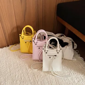 Stylish mini crossbody phone bag for women, multi-color compact shoulder handbag.