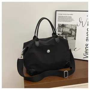 Gran bolsa de viaje negra de gran capacidad con correa para el hombro y gym.