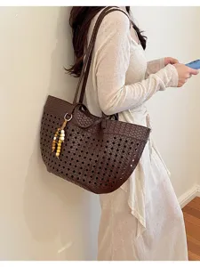 Brown woven leather tote bag for women, large capacity casual shoulder bag for daily work commute.