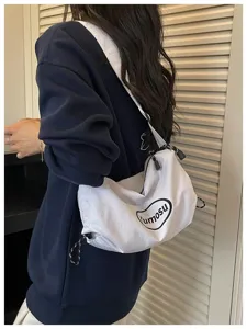 Lässige weiße Canvas-Umhängetasche mit Kordelzug für Damen für Alltag und Reisen.