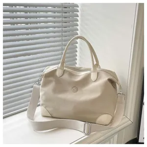 Gran bolsa de viaje informal con correa ancha para el hombro, uso diario ideal.