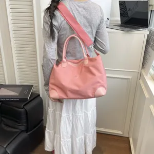 Bolsa de viaje de nailon rosa con correa ancha, bolsa grande de equipaje para fin de semana.