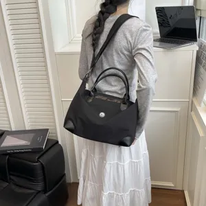 Gran bolso de viaje para mujer, bolso de hombro de nailon informal, bolso tote portatil.