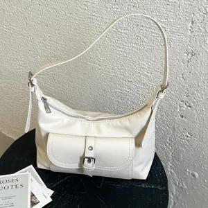 Stijlvolle witte damestas voor over de schouder, vintage handtas met handig voorvakje.