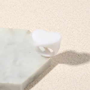 Minimalist white heart acrylic ring for women, trendy fashion resin finger jewelry daily wear.
