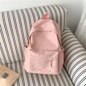 Sac à dos rose motif étoiles pour école quotidien, cartable étudiant léger et mignon.