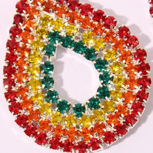 Colorful rhinestone lip pendant detailed view, dazzling multi-color crystals set in silver.