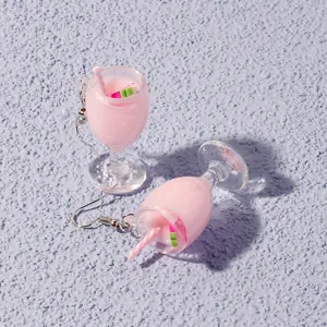 Cute pink milkshake glass drop earrings with straw and fruit slice details for women daily wear