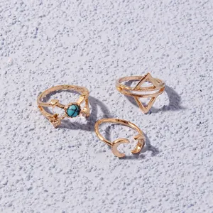 Detailed view of trendy geometric alloy rings set featuring chic turquoise and moon designs.