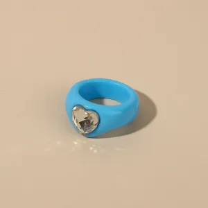 Blue acrylic heart rhinestone ring for women, stylish minimalist resin jewelry piece.